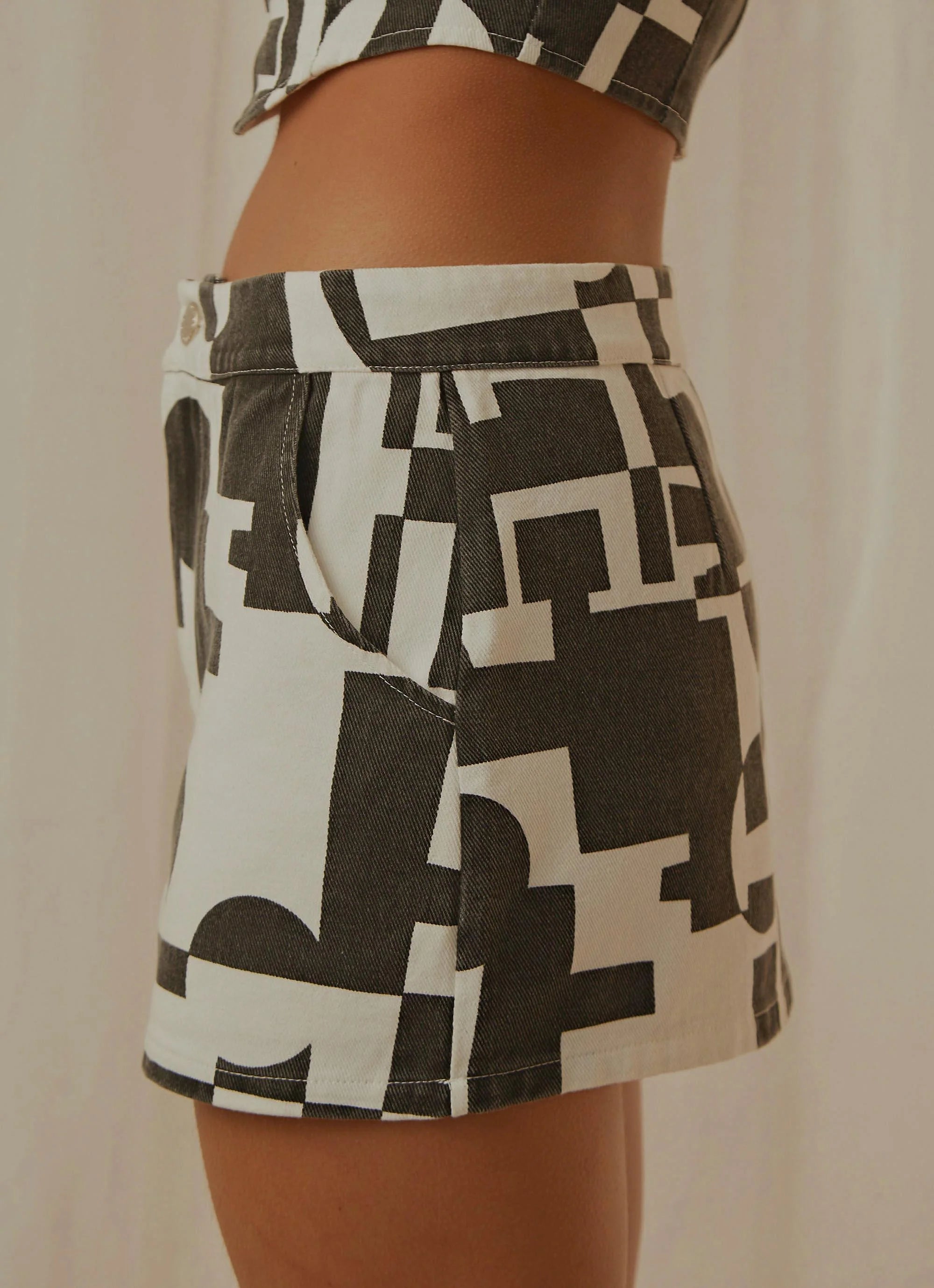 New York Times Mini Skirt - Black and White Geo